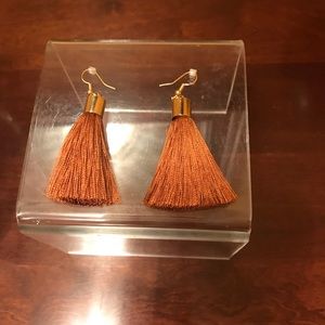 Feather earrings for pieced ears.